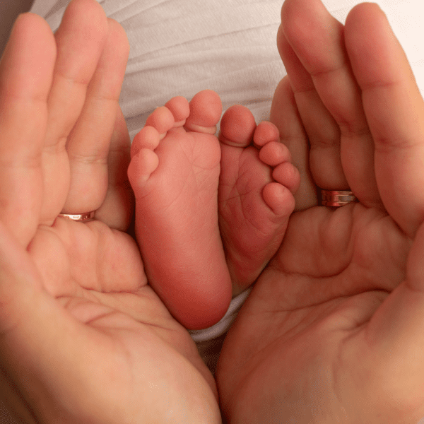 Picture of mom's hands and baby's feet